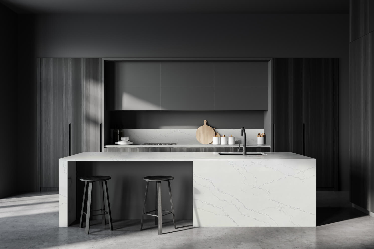 Modern kitchen with a white island and dark cabinets