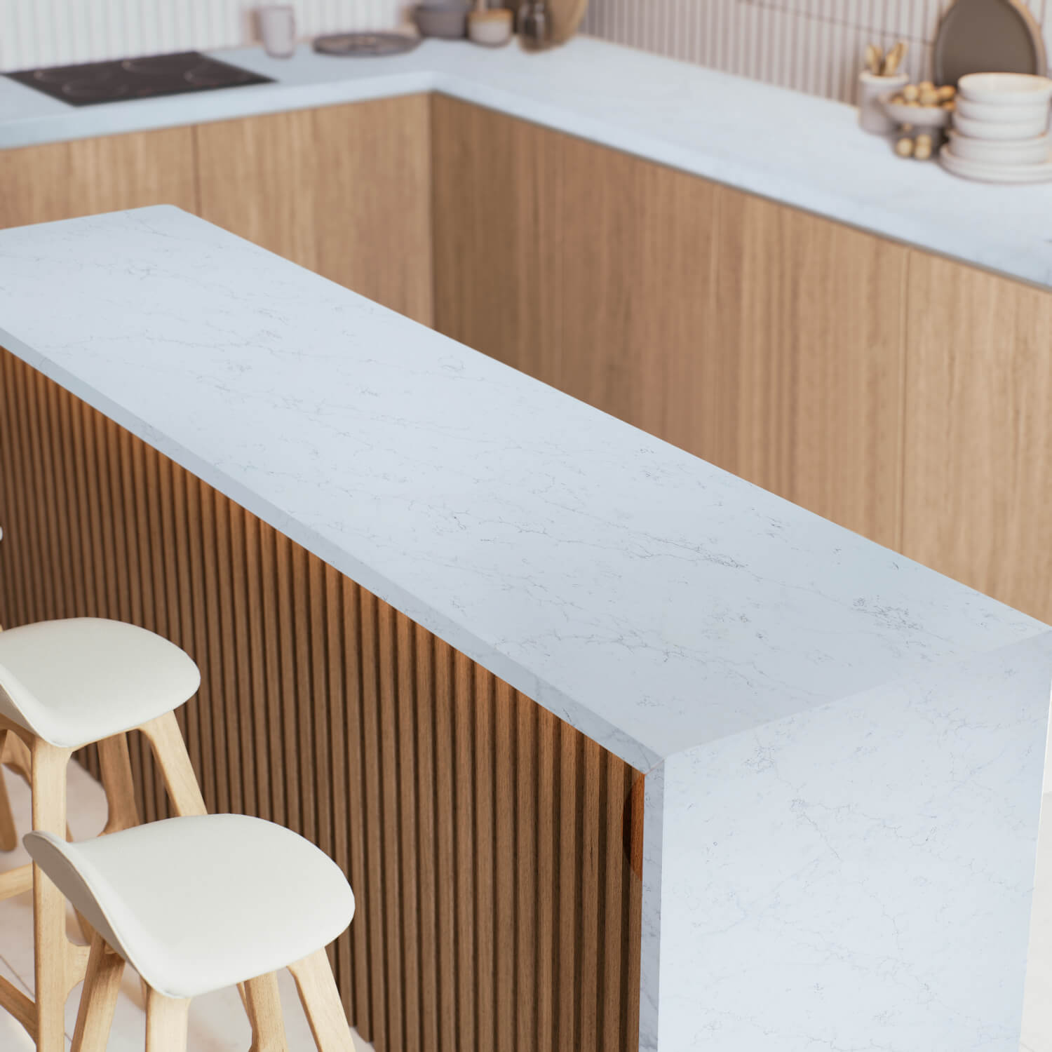 Modern kitchen with a white island and wooden cabinets