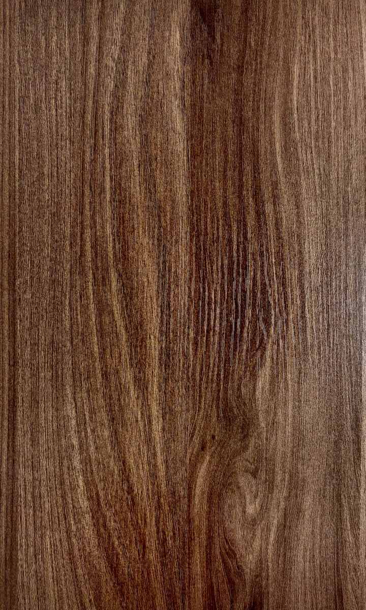 Close-up of a wooden surface with a brown and beige color pattern