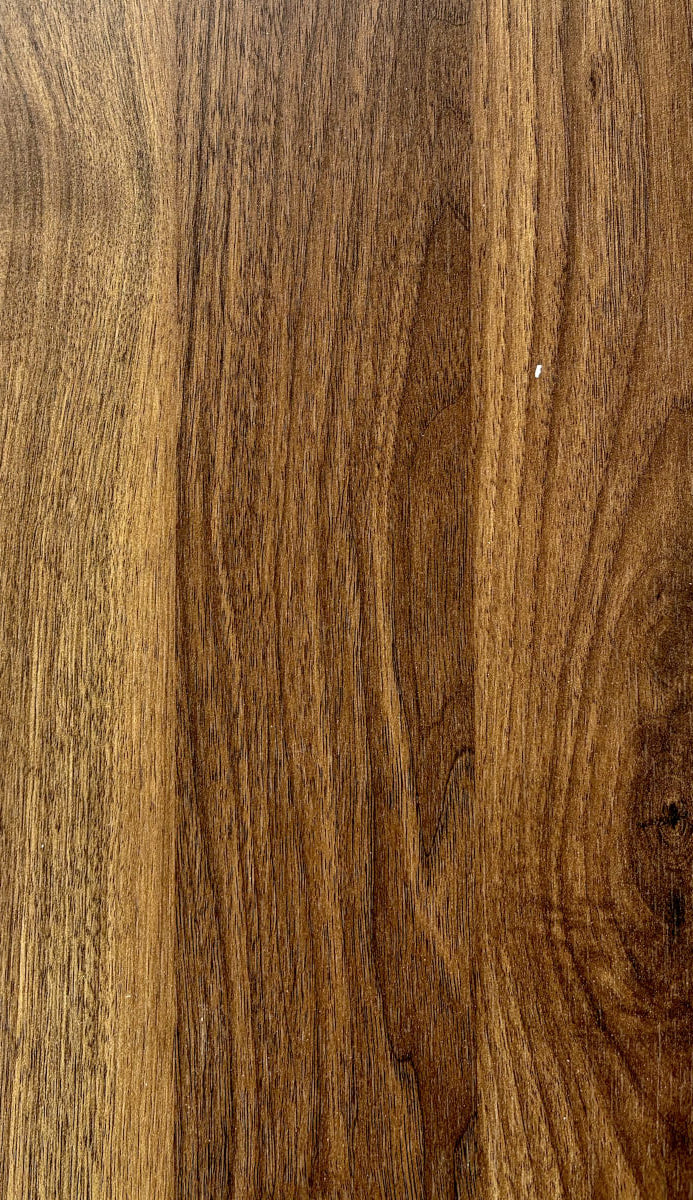 Close-up of a wooden surface with visible grain and texture