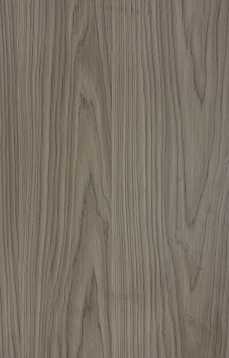 Close-up of a wooden surface with a grayish-brown color and visible grain pattern.